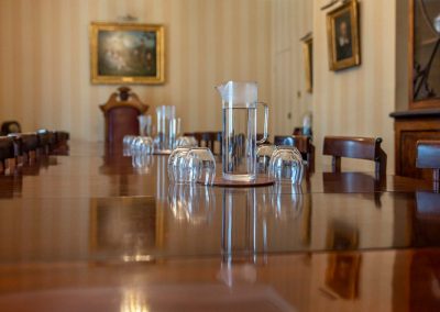 Glasses on the boardroom table of the Council room