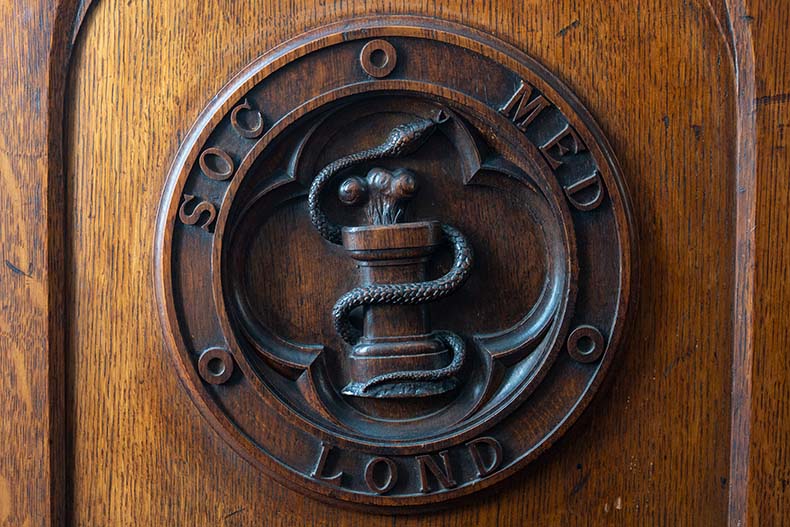 Wooden coat of arms of the Medical Society of London